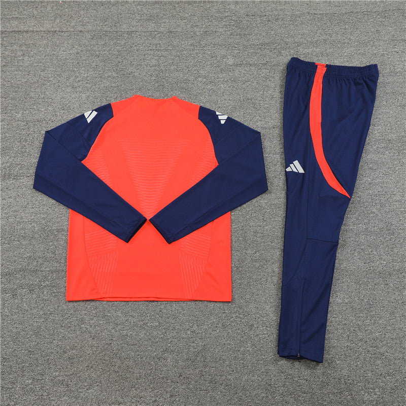 Survêtement bleu et orange de Manchester United