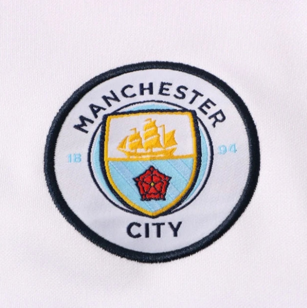Survêtement Manchester City bleu clair et blanc