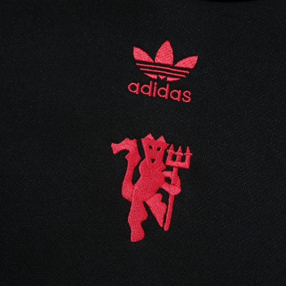 Survêtement noir et rouge de Manchester United